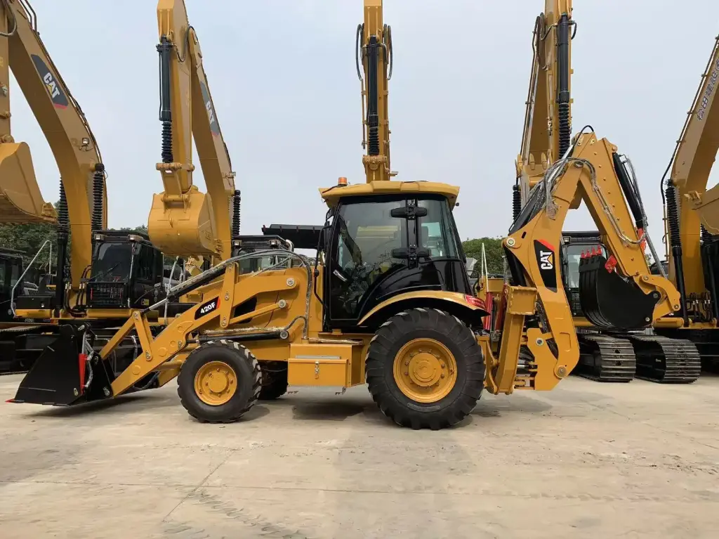 Retroexcavadora CAT 420F + extensible + cucharón abierto